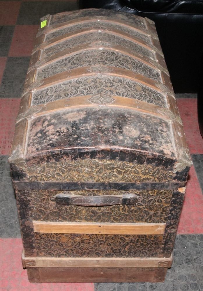 ANTIQUE HUMPBACK TRUNK WITH EMBOSSED GILT & Kastner Auctions