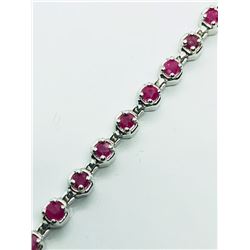 44) STERLING SILVER RUBY BRACELET