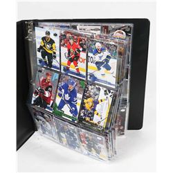 BINDER OF ASSORTED HOCKEY CARDS