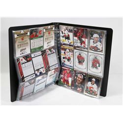 BINDER OF ASSORTED CALGARY FLAMES HOCKEY CARDS