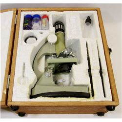 TASCO MICROSCOPE IN WOOD BOX
