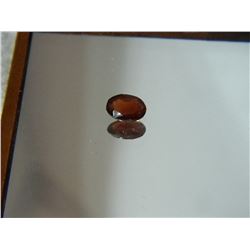 GEMSTONE - GARNET - OVAL FACETED - 6.8 X 4.9 X 2.8mm