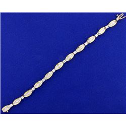 5ct TW Baguette and Round Diamond Tennis Bracelet in 14k Yellow Gold