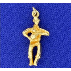 Man Holding Camera Pendant in 14k Yellow Gold