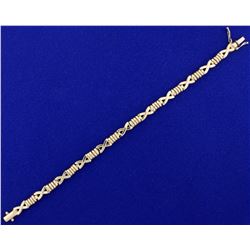 Italian Made 7 Inch  X  Link Designer Bracelet in 14k Yellow Gold