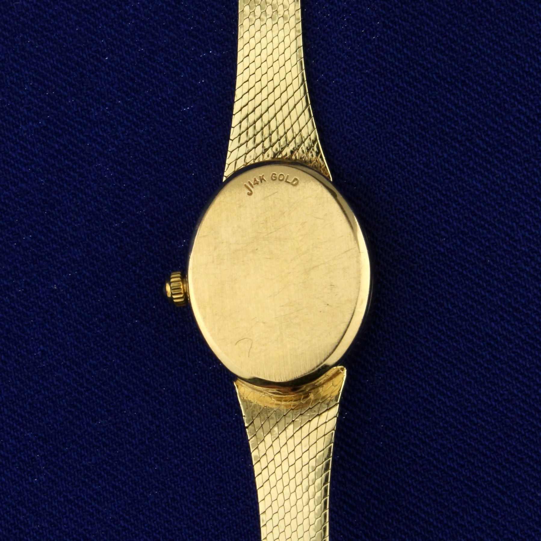 Vintage Women's Geneve Diamond and Sapphire Watch in 14K Yellow Gold