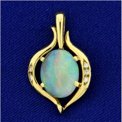 Black Opal and Diamond Pendant in 18K Yellow Gold