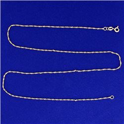 20 inch Twisting Flat S Link Neck Chain in 14k Yellow Gold