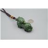 Image 4 : A Canada Jade "Auspicious Beast" Pattern Hand Piece.