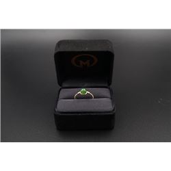 A 18K Gold Ring Inlaid with a Round Canada Jade.