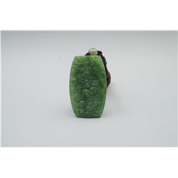 A Canada Jade "Cloud" Pattern Pendant with String Necklace.