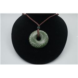 A "Spiral" Pattern Peace Buckle Pendant with String Necklace.
