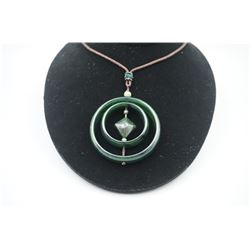 A Canada Jade Double Circle "Rhombus" Shape Pendant with String Necklace.