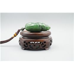 A Canada Jade "Lotus Leaf and Golden Toad" Pattern "Shell" Shape Hand Piece.