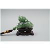 Image 1 : A Canada Jade "Auspicious Beast" Pattern Hand Piece.