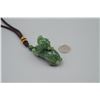Image 4 : A Canada Jade "Auspicious Beast" Pattern Hand Piece.