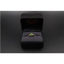 A 18K Gold Ring Inlaid with a Round Canada Jade.
