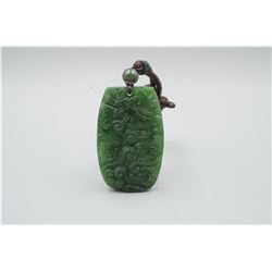 A Canada Jade "Cloud" Pattern Pendant with String Necklace.