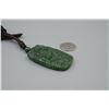 Image 4 : A Canada Jade "Cloud" Pattern Pendant with String Necklace.