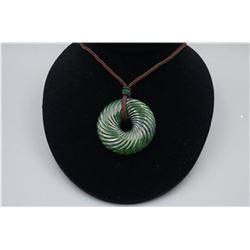 A "Spiral" Pattern Peace Buckle Pendant with String Necklace.