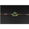 Image 3 : A 18K Gold Bracelet Inlaid with a Round Canada Jade.