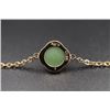 Image 4 : A 18K Gold Bracelet Inlaid with a Round Canada Jade.