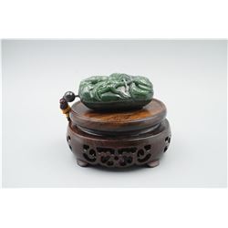 A Canada Jade "Dragon and Cloud" Pattern Hand Piece.