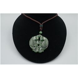 A Canada Jade "Double Fish" Pattern Pendant with String Necklace.