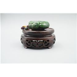 A Canada Jade "Golden Toad and Coin" Pattern Hand Piece.