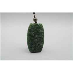 A Canada Jade "Cloud" Pattern Pendant with String Necklace.