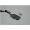 Image 4 : A Canada Jade "Cloud" Pattern Pendant with String Necklace.