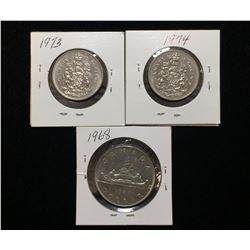 1973, 1974 Half Dollars & 1968 Dollar Candian Coins