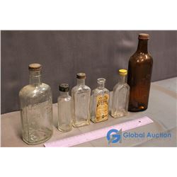 6 Assorted Vintage Glass Bottles ( Gordon's Dry Gin; Pimex; Foss Pure Vanilla Extract; J.R. Watkins,