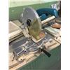 Image 1 : 10” MAKITA Swiveling Steel Wheel Bench Mount Chop Saw