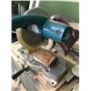 Image 2 : 10” MAKITA Swiveling Steel Wheel Bench Mount Chop Saw