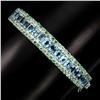 Image 1 : Natural Swiss Blue Topaz 5x4 MM & Emerald Bangle