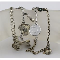 GROUP OF 4 STERLING SILVER CHARM BRACELETS