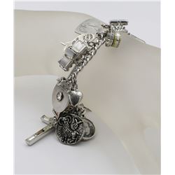 STERLING SILVER CHARM BRACELET