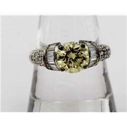 ESTATE STERLING SILVER RING WITH YELLOW STONE AND