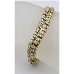 TWO STERLING SILVER GOLD TONED BRACELETS