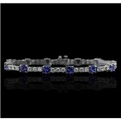 14KT White Gold 6.48 ctw Tanzanite and Diamond Tennis Bracelet