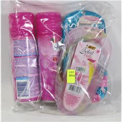 BAG OF WOMENS RAZORS AND SHAVE GEL