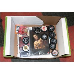 HOCKEY COLLECTIBLES INC GAME USED OILER PUCKS,