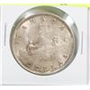 Image 1 : 1935 CANADIAN SILVER DOLLAR COIN.