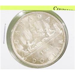 1963 CANADIAN SILVER DOLLAR COIN.
