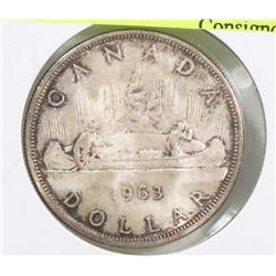 1963 CANADIAN SILVER DOLLAR COIN.
