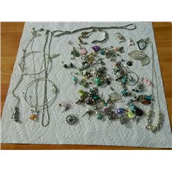 BAG OF ASSORTED JEWELRY - EARRINGS(MIXTURE) & MORE
