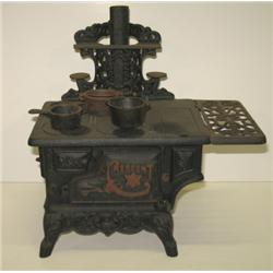 CAST IRON CHILD’S COOK STOVE