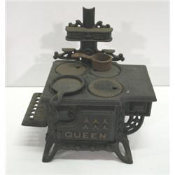 CAST IRON CHILD’S COOK STOVE