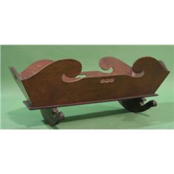 EARLY WALNUT DOLL CRADLE